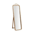 Elegant Freestanding Mirror with Decorative Top Design